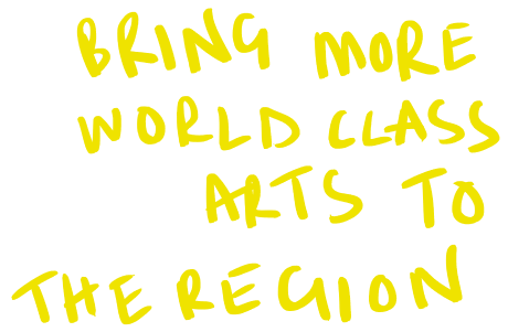 Handwritten text saying "Bring more world class art to the region"