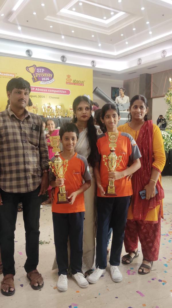 Parents, children and teachers sharing a win.