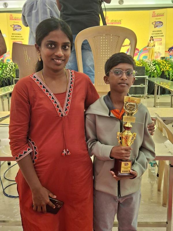 Supporting their children at the SIP Abacus regional competition.