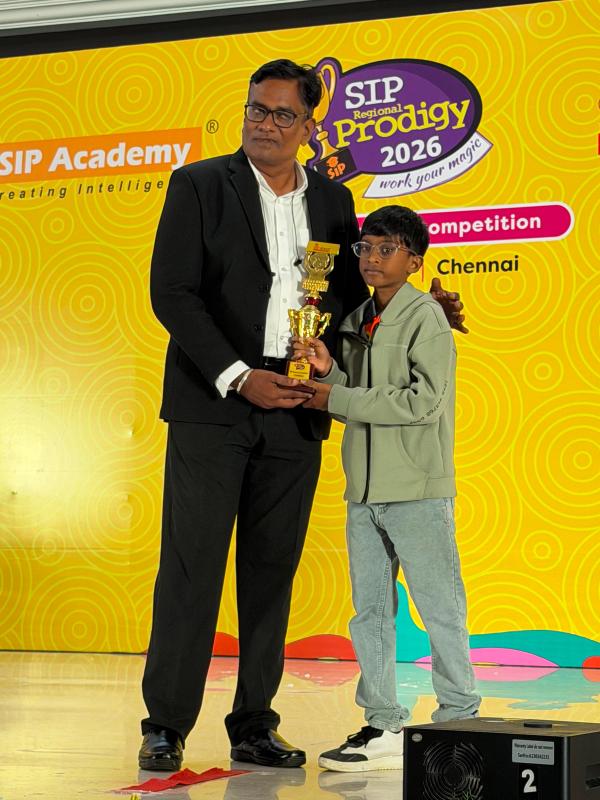 Our Mylapore cohort collecting their 2026 competition awards.