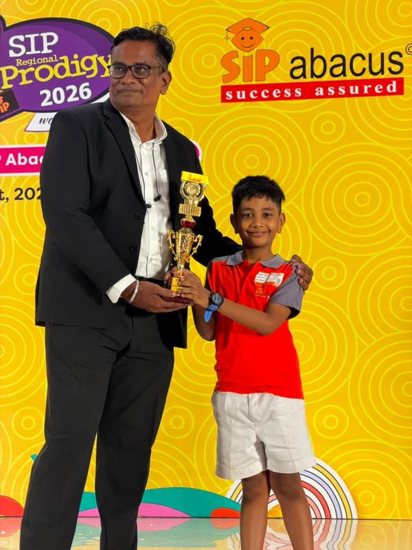 Collecting a winner's trophy at SIP Regional Prodigy 2026, Chennai.