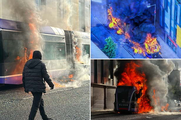 Bus set alight by masked protesters as violence spreads following stabbing attack Bus set alight by masked protesters as violence spreads following stabbing attack