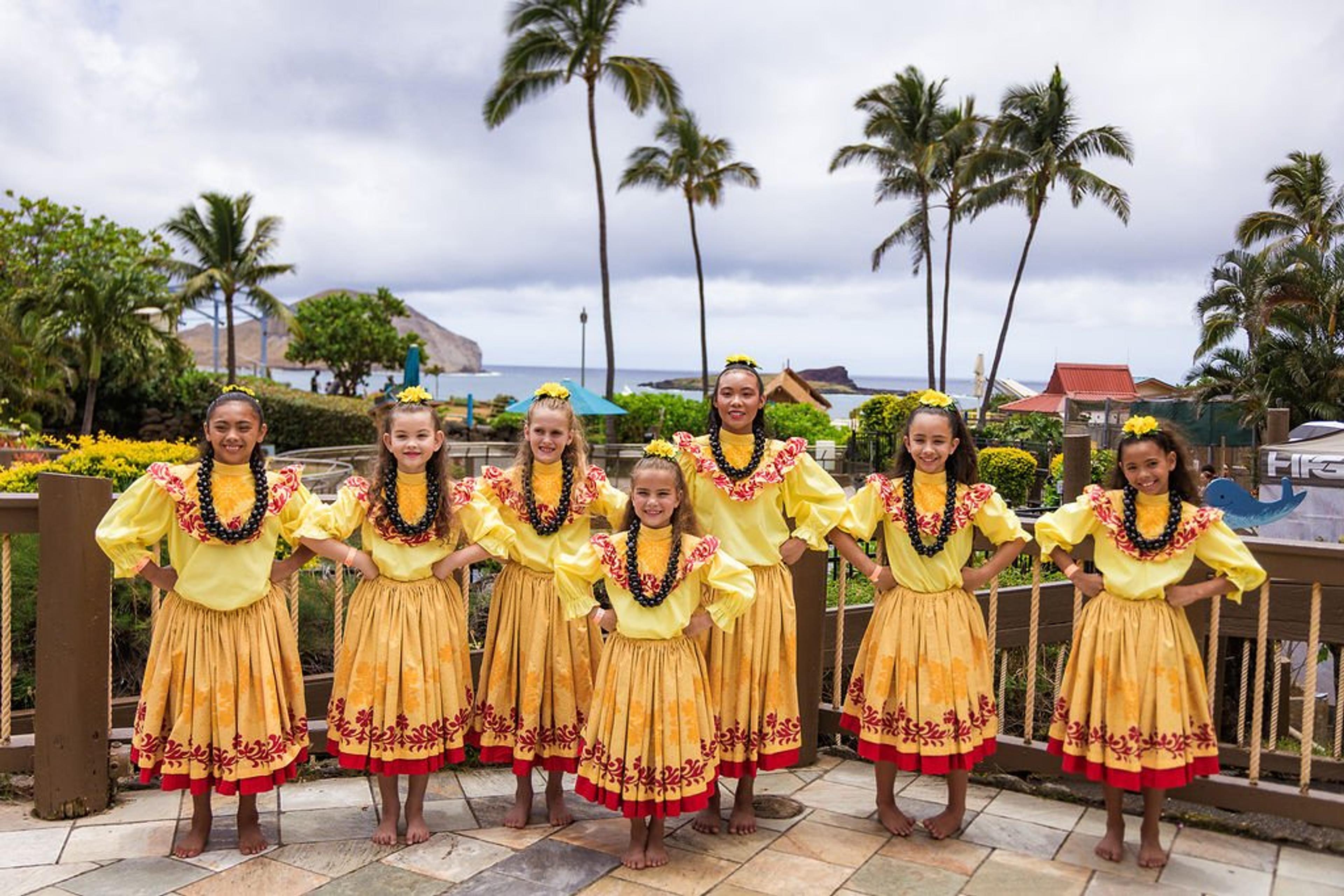 Keiki hula dancers in yellow pāʻū at Sea Life Park