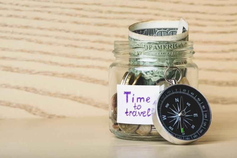 Illustration for “wooden surface with money compass”