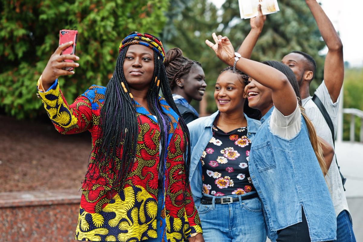 Illustration for “group-five-african-college-students-spending-time-together-campus-university-yard-black-afro-friends-making-selfie-phone-education-theme”