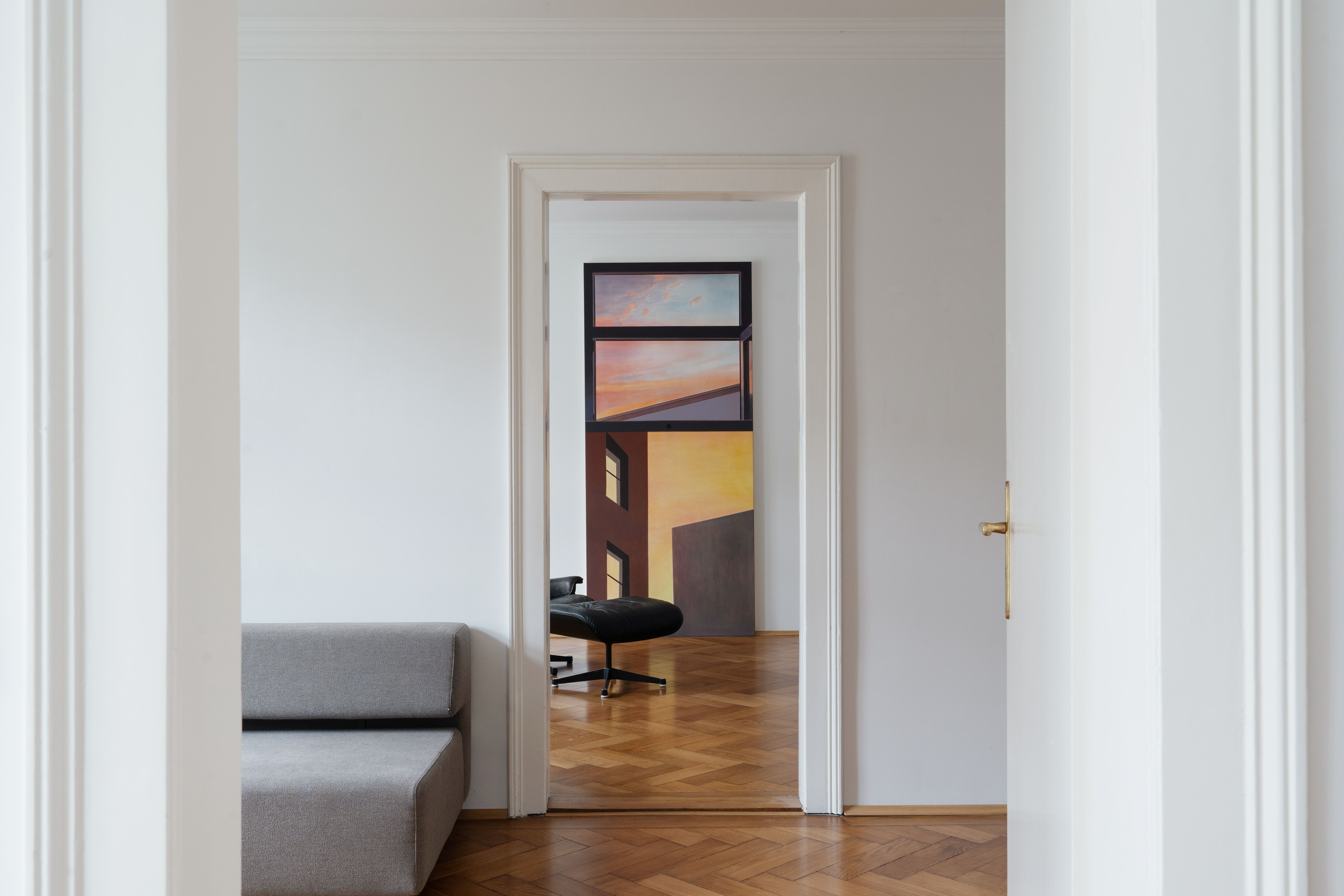 Installation shot of a painting in a domestic setting