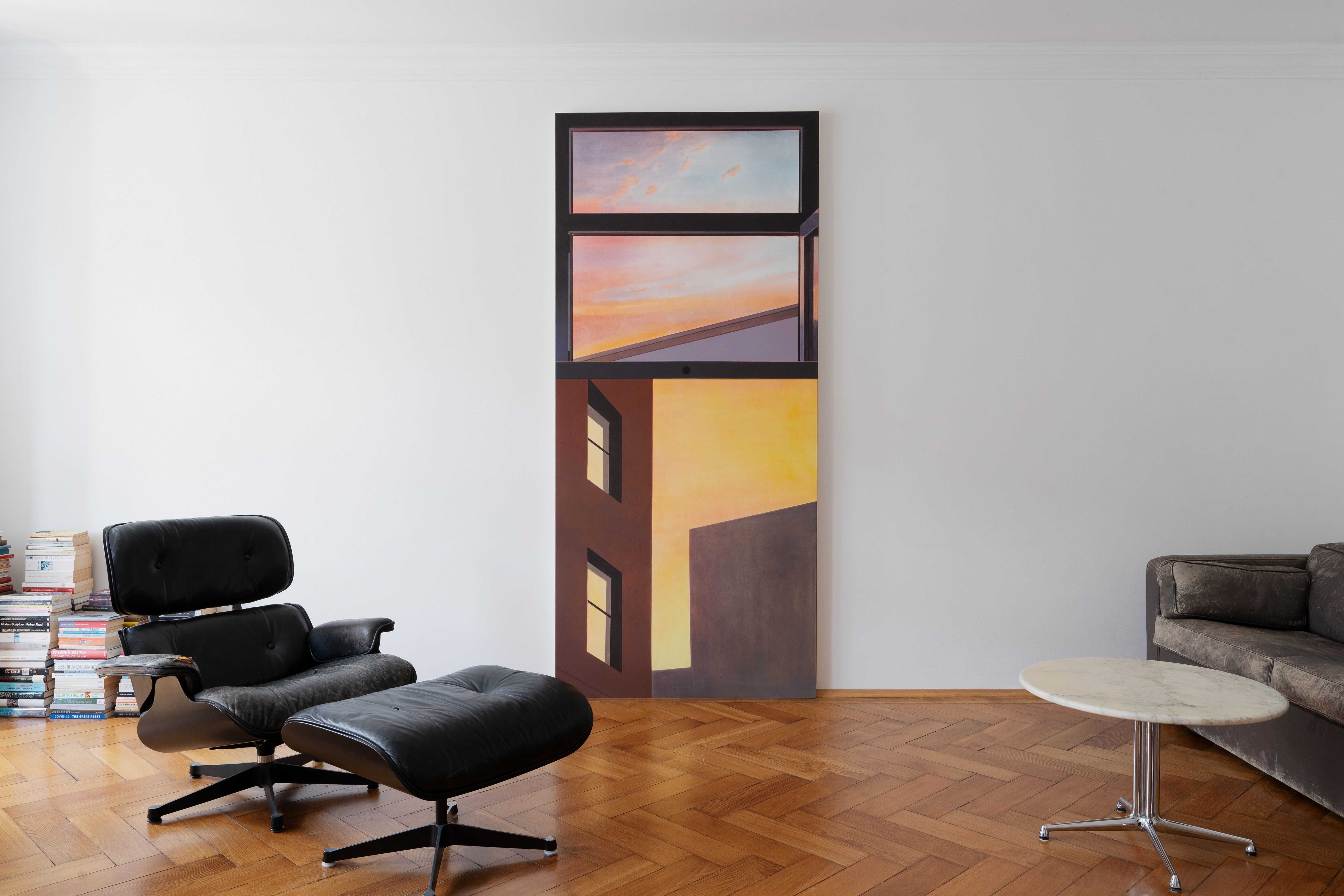 Installation shot of a painting in a domestic setting