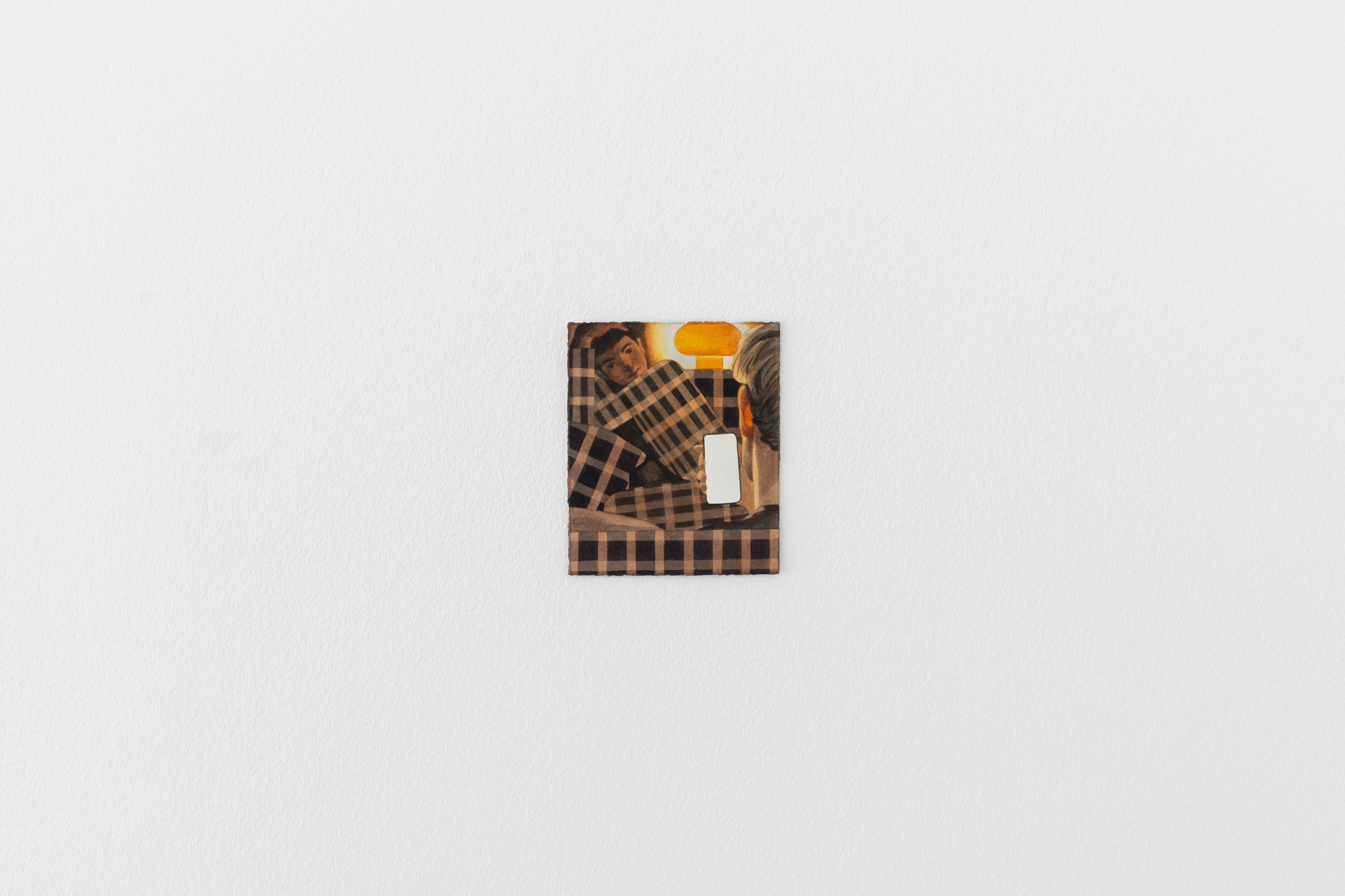 Small watercolour painting on wall