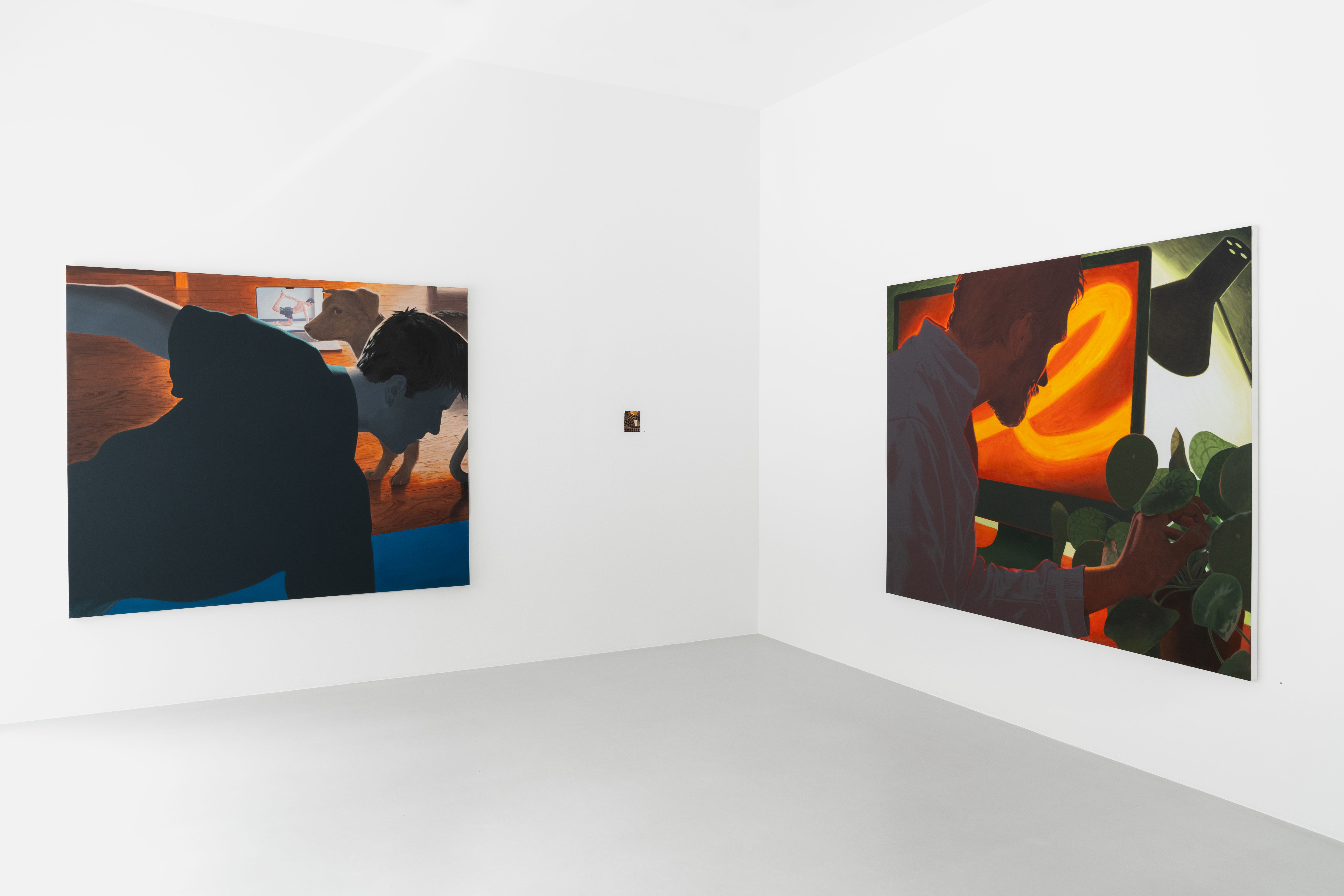 Exhibition view of two large scale figurative paintings and a small watercolour