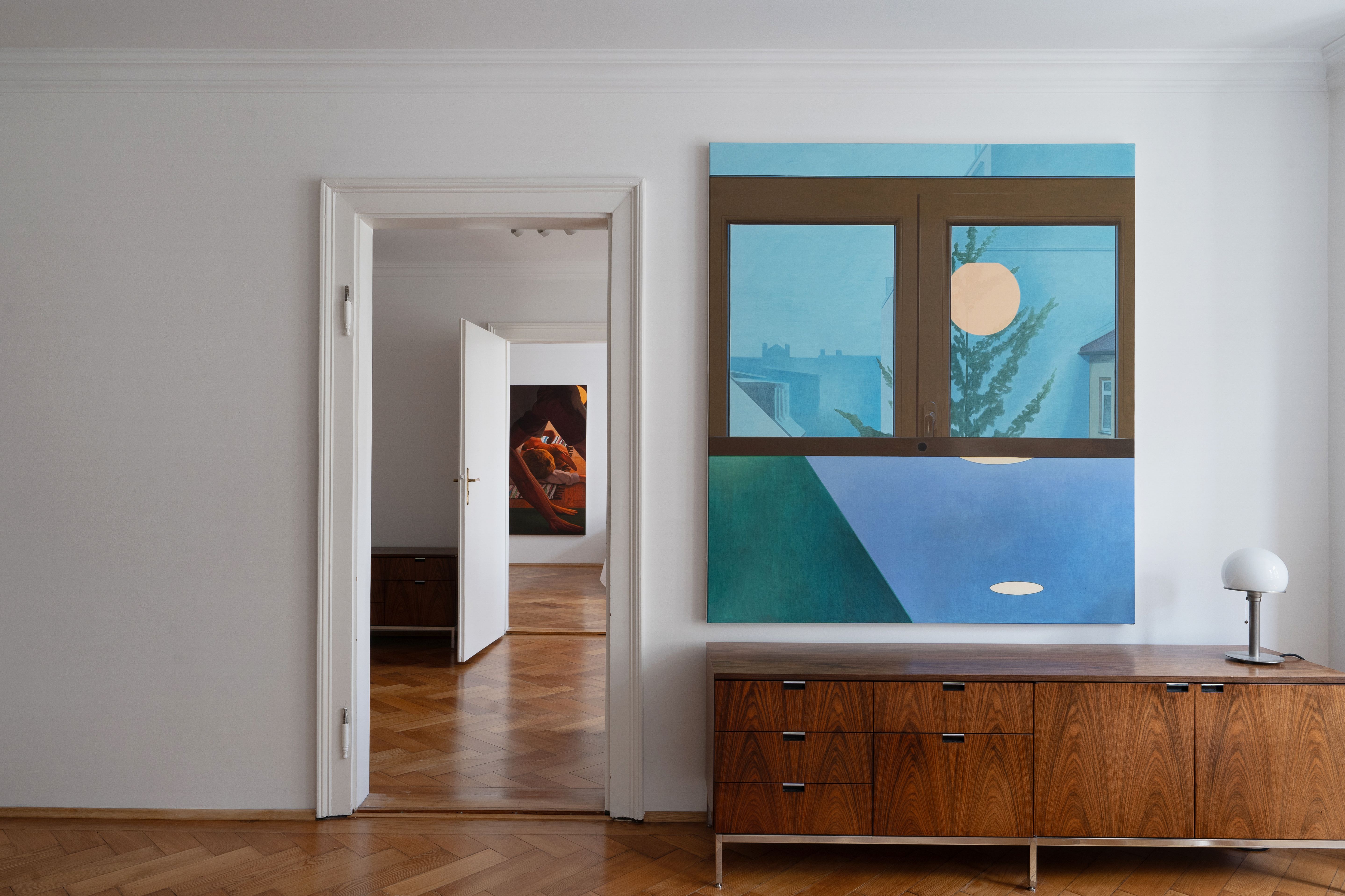 Installation shot of a painting in a domestic setting