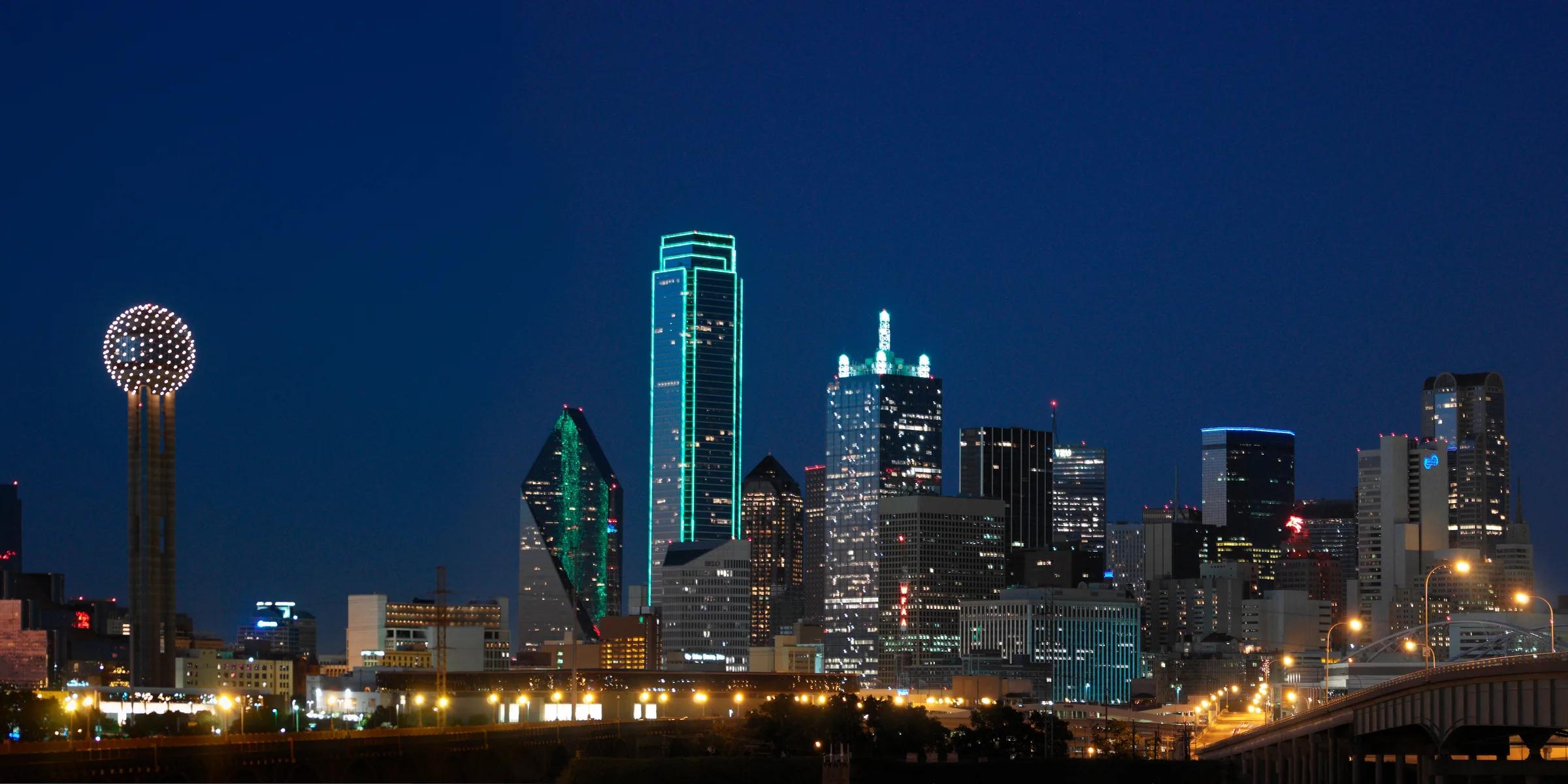 Reunion Tower and the Downtown Dallas skyline after dark