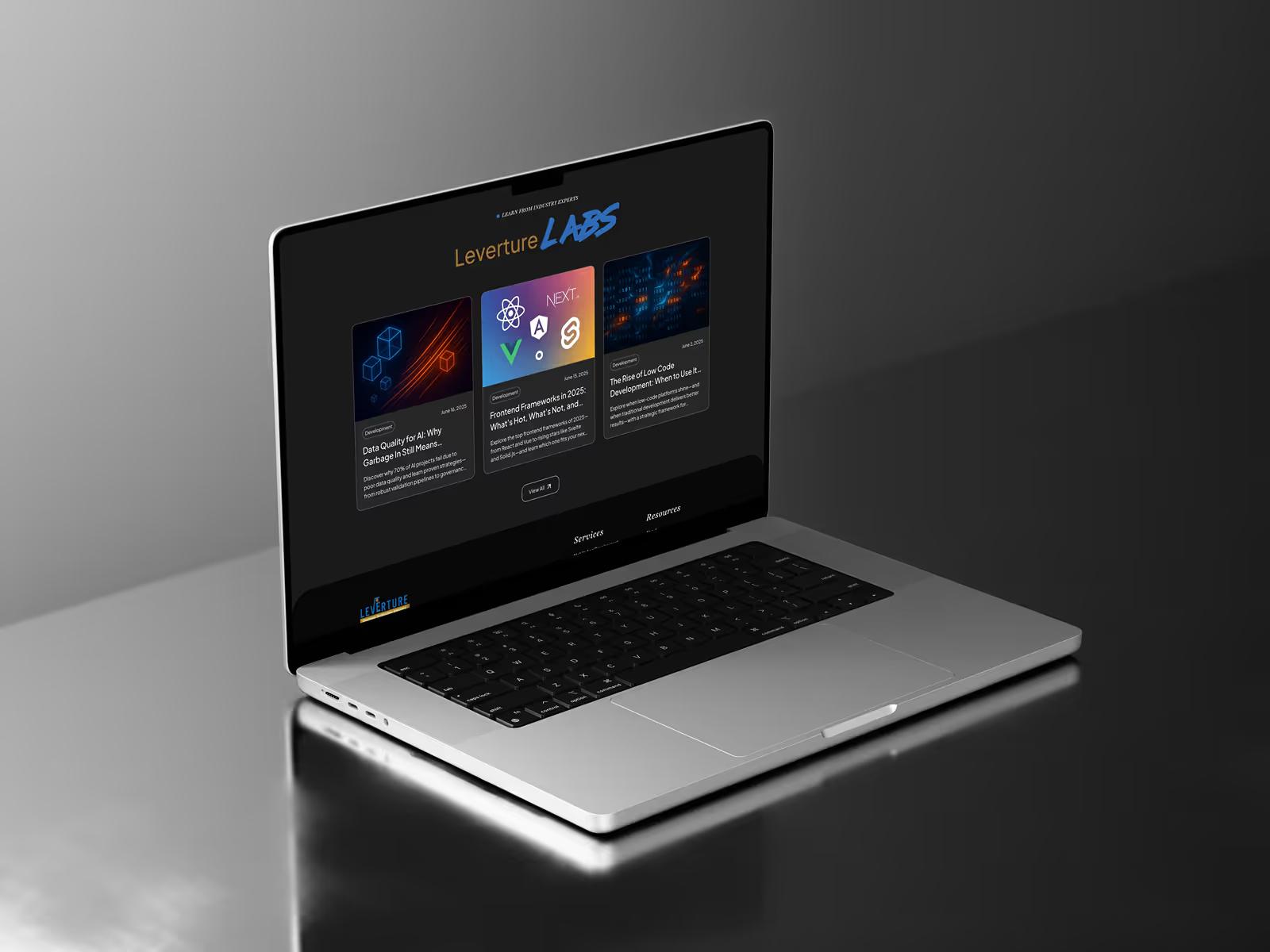 Laptop mockup displaying the Leverture Labs blog page with featured tech articles about React frameworks, code quality, and low-code development