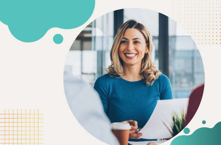 women smiling at the success she experienced through helping others in the web design business.