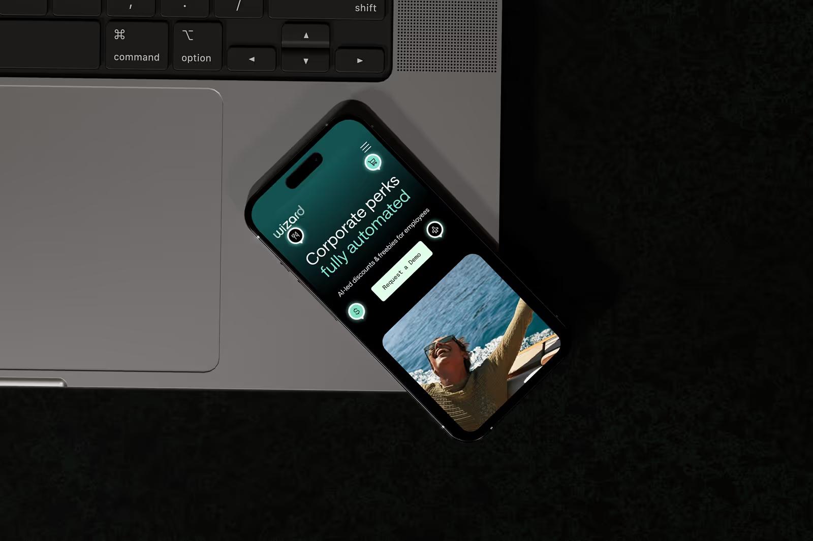 Wizard Perks responsive design shown across laptop, tablet, and mobile devices