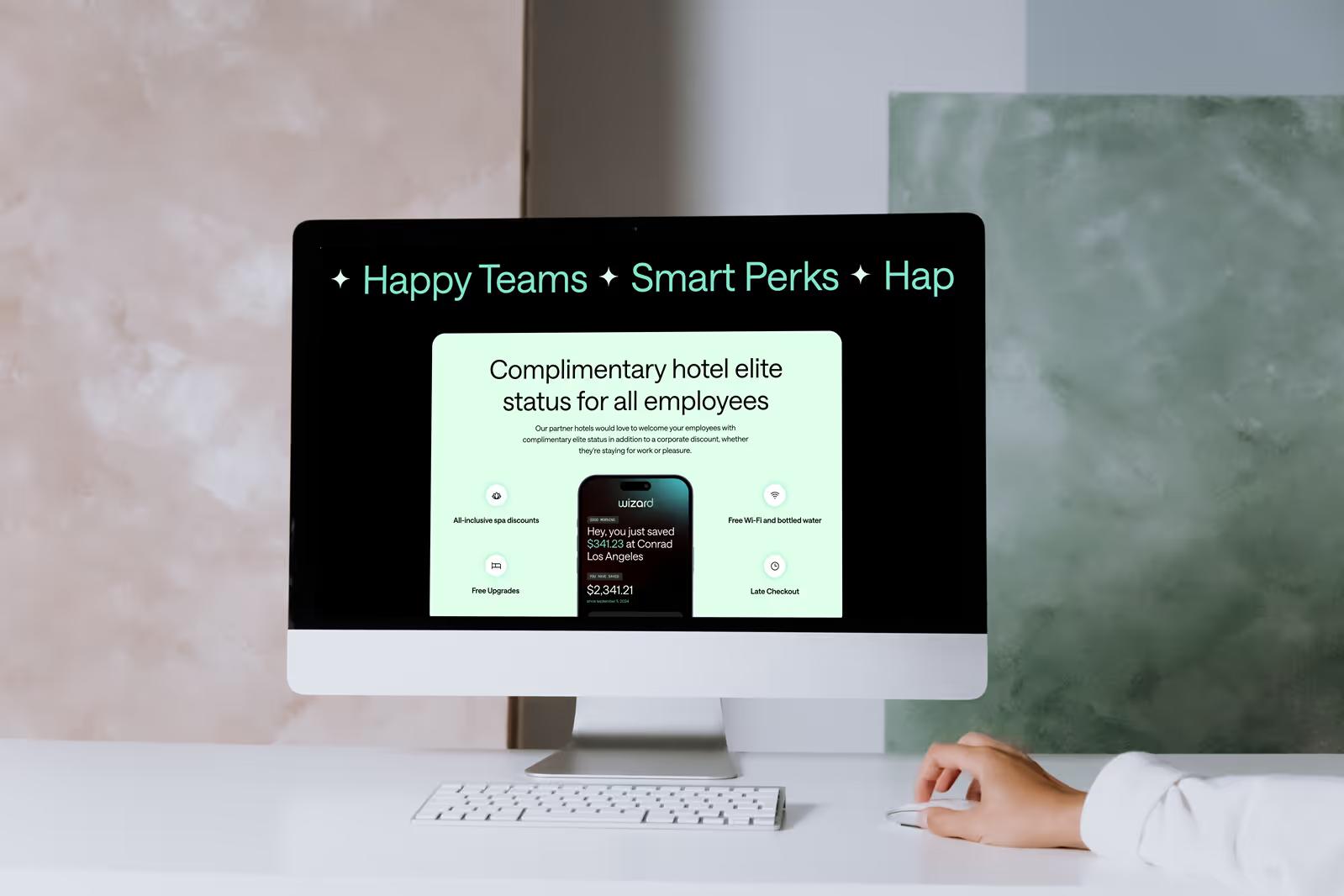 Wizard Perks hotel elite status and marquee section displayed on iMac desktop
