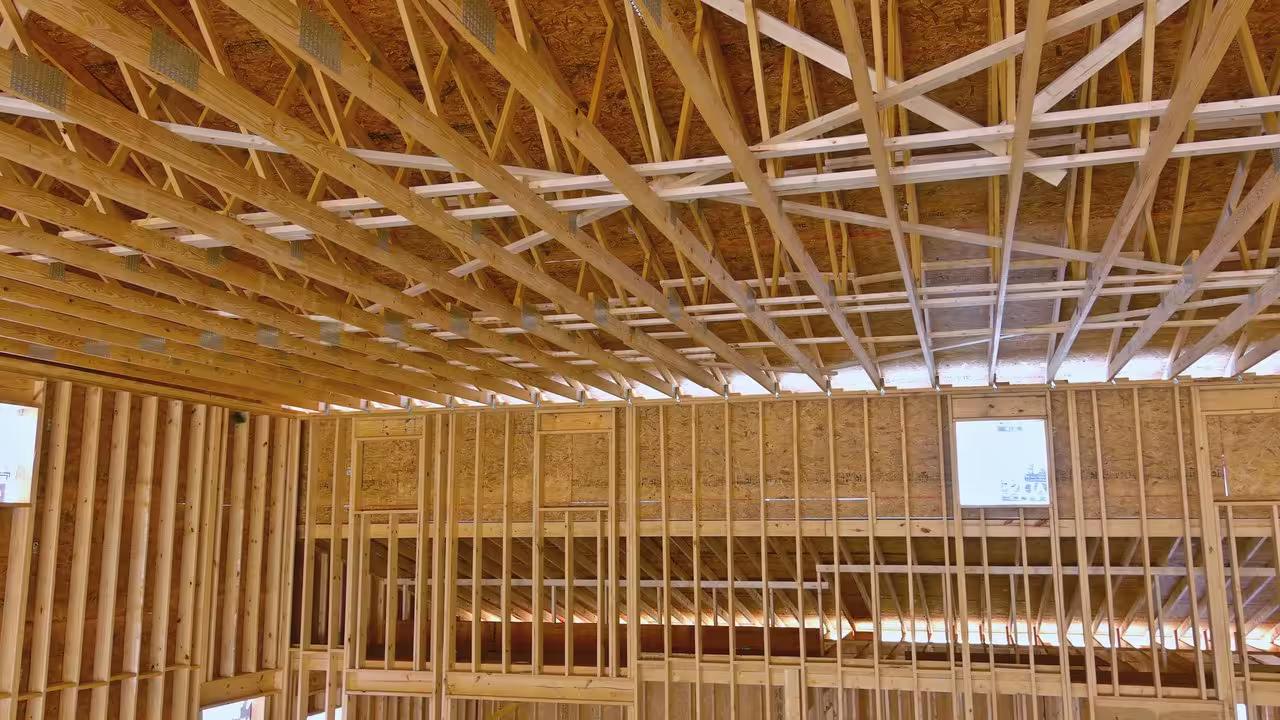 Interior framing of a house under construction, the kind of long-consideration project that converts slowly and needs a documented process page.