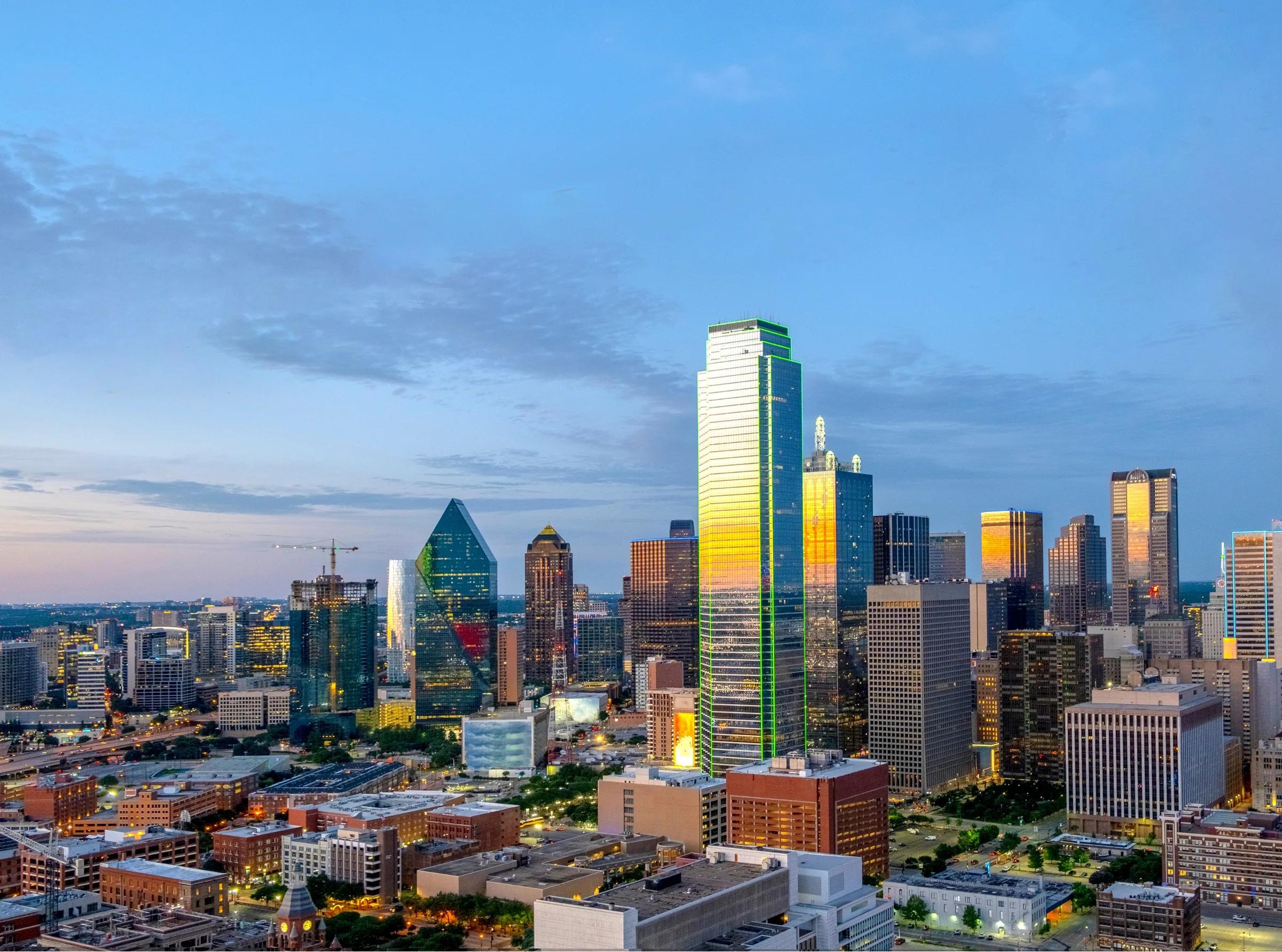 The Downtown Dallas skyline at dusk from an elevated vantage point