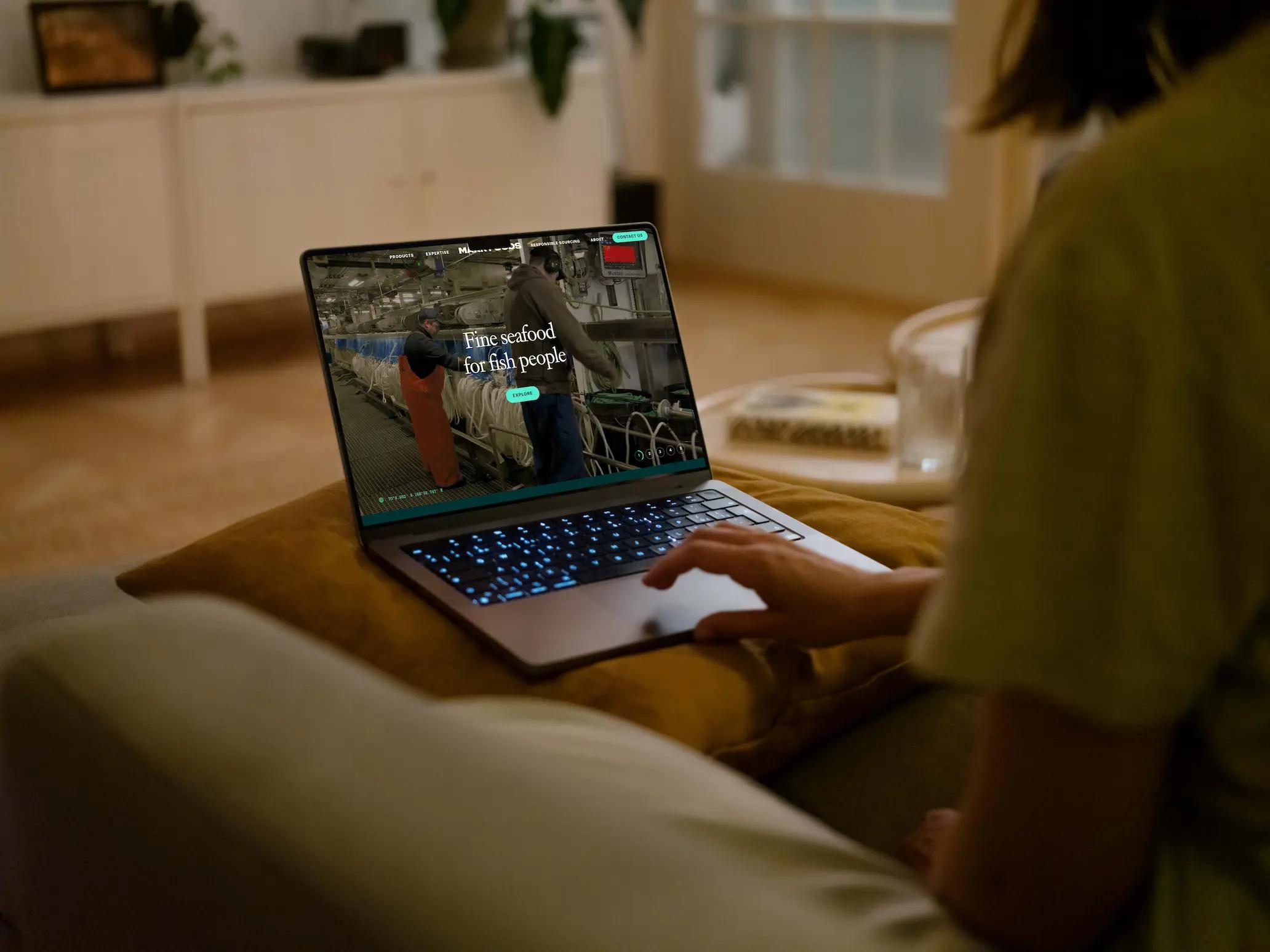 person looking at the mark foods homepage slider