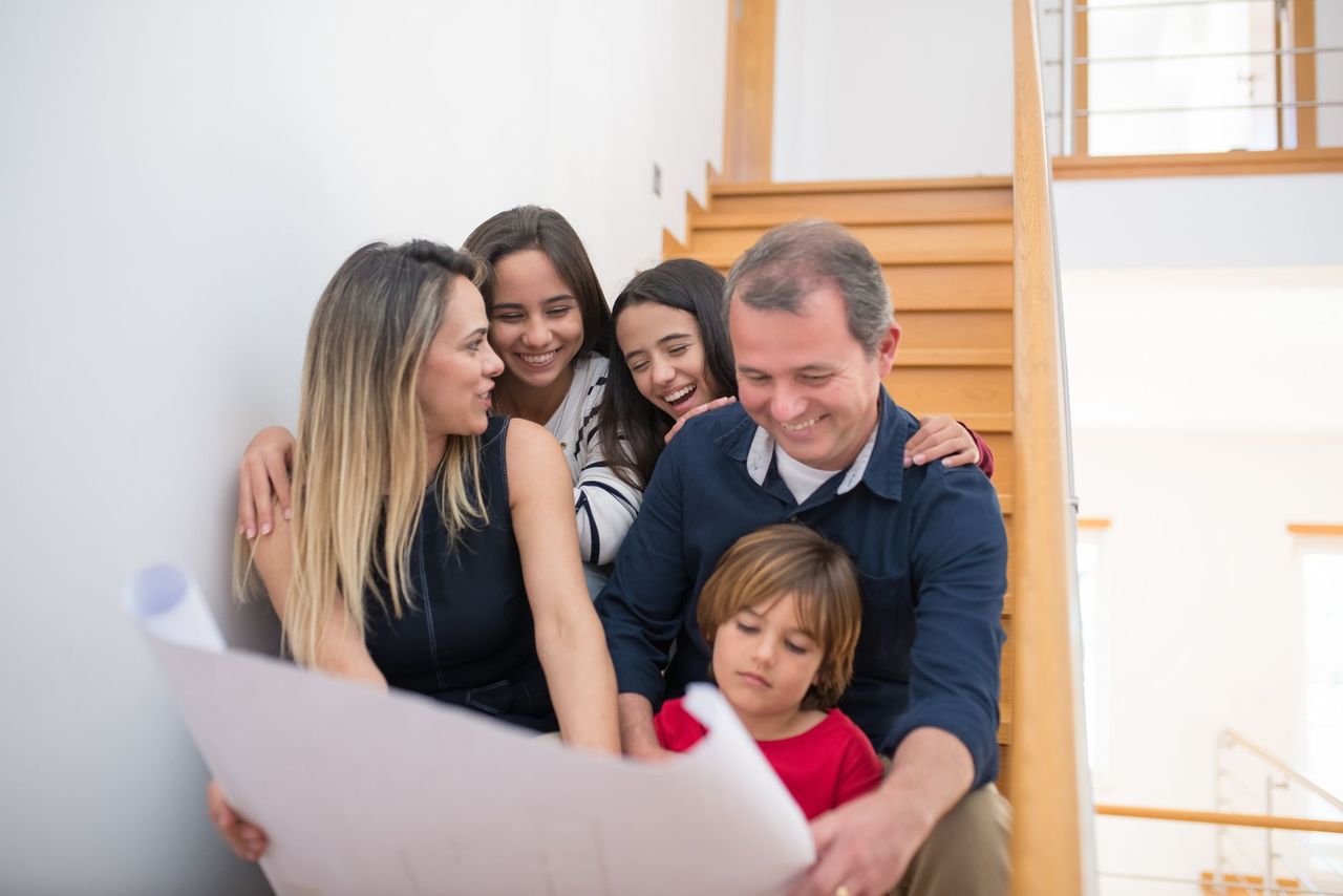 Close-up of a family chore meeting note with task, decision, owner and review date columns