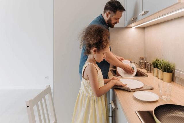 Child using a simple visual chore routine at home