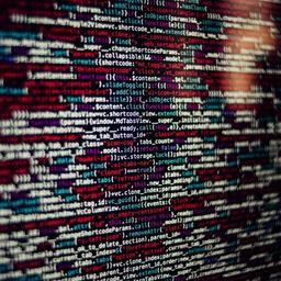 a close up of a computer screen filled with lots of code .