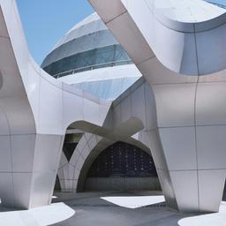 a modern building with a lot of arches and columns .