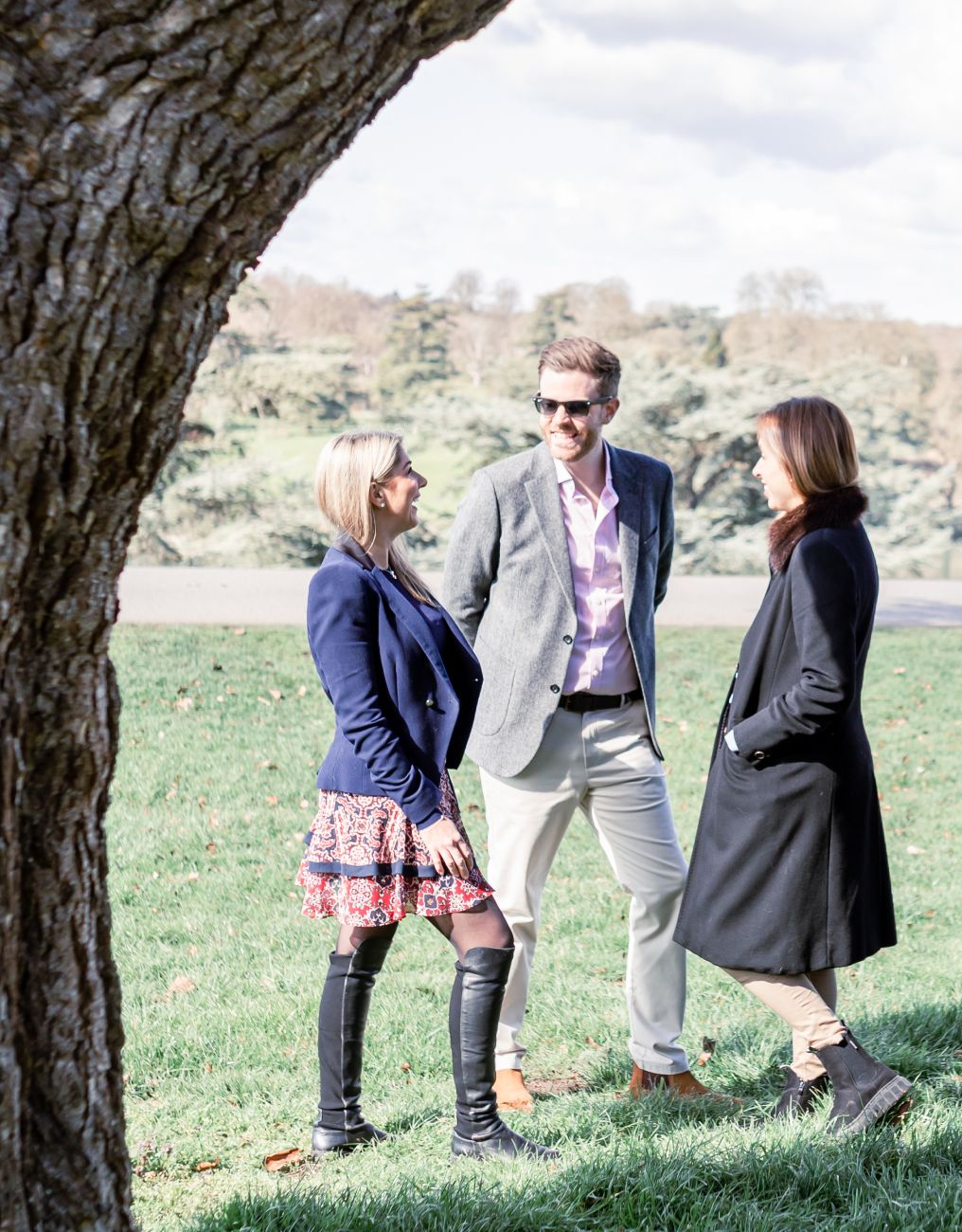 Oxford Property Consulting team talking in Blenheim Palace grounds