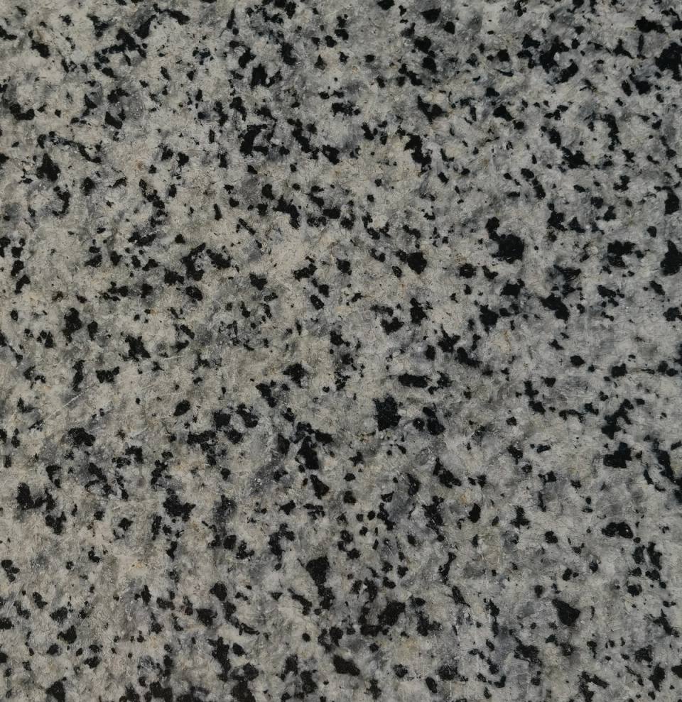 Xinjiang Green Diamond polished granite tile with green crystal grains for luxury building facade and flooring.