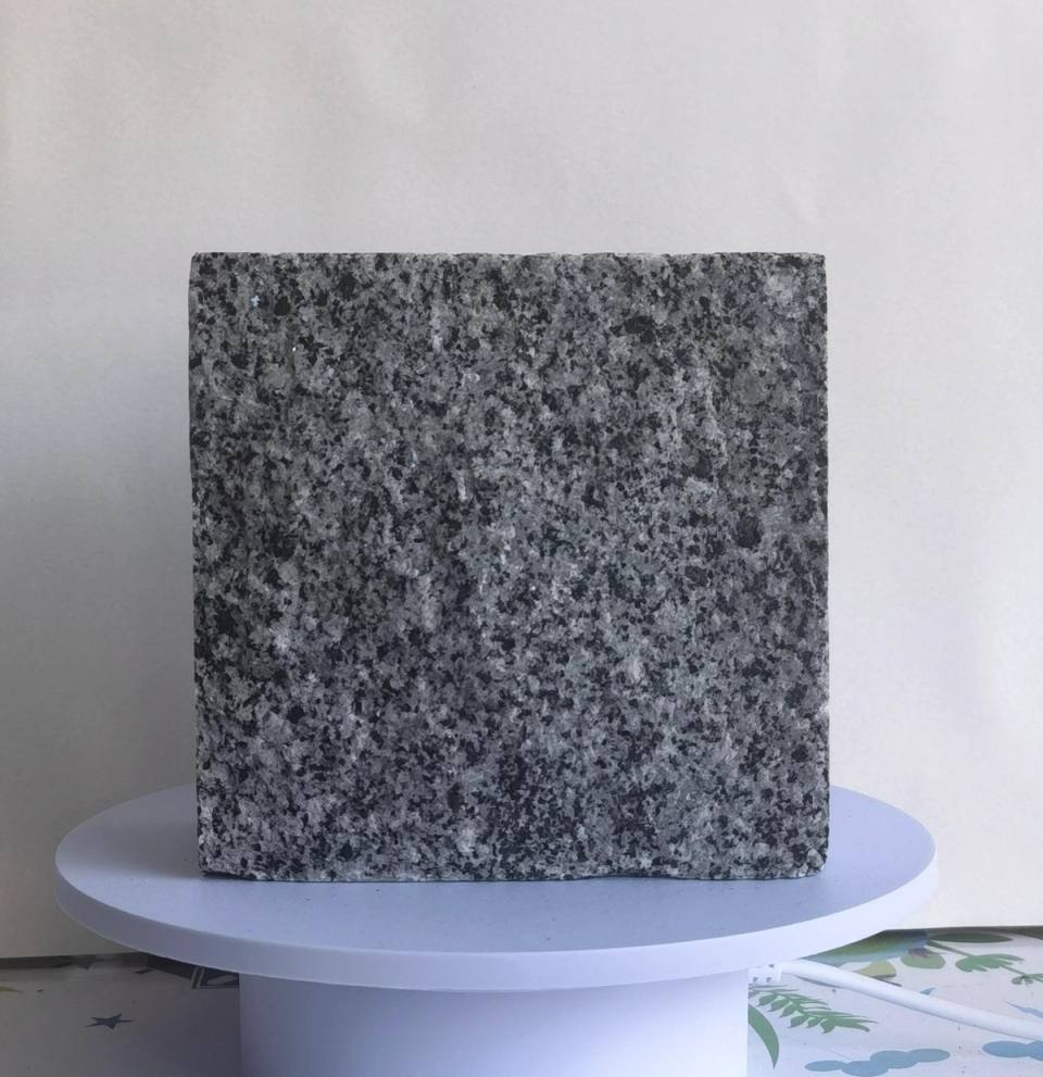 Classical Sesame Black split finish granite cobblestone with a natural dark grey-black colour and textured split surface for driveways, streets and landscape paving projects.