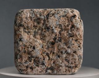 Imperial Sunset antique finish granite cobblestone with warm sunset-gold tones, silver-grey crystals, dark natural mineral grains and softly aged edges