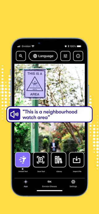 A screenshot of the Envision AI app reading a sign that says "This is a neighbourhood watch area".
