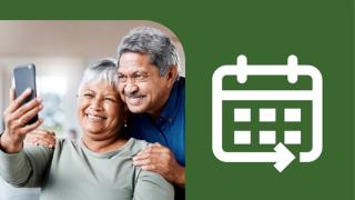 A couple looking at a mobile phone together. Next to them is a white calendar icon on a green background.