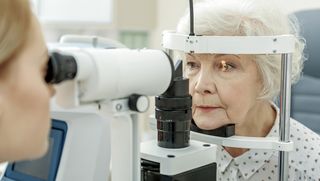 Older person getting their eyes tested
