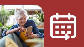 A woman using her tablet at home. A calendar icon sits to the left of the image on a red background.