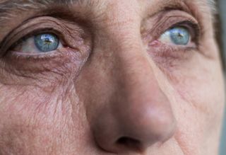 Close up on the eyes and nose of an older woman