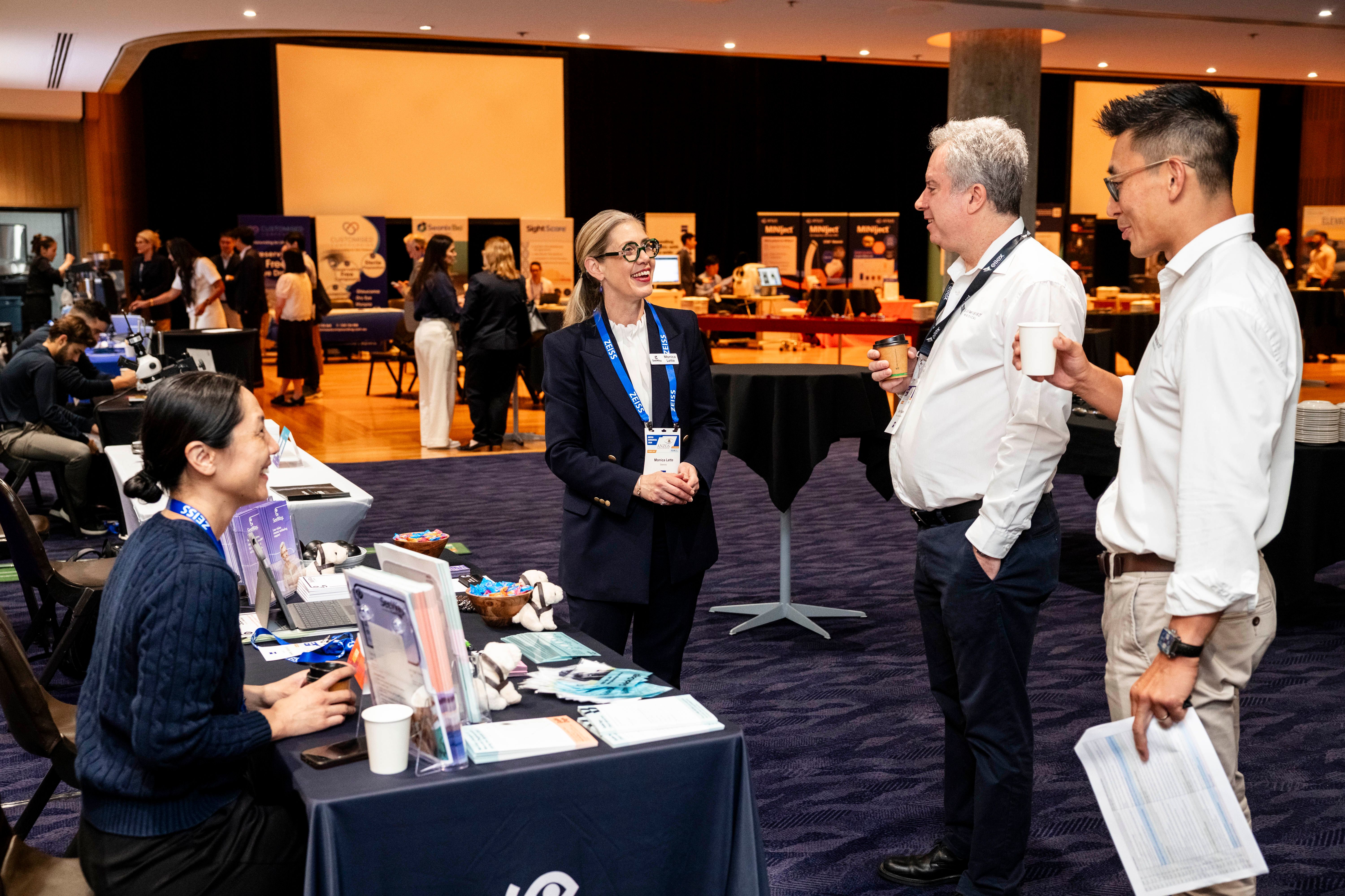 SeeWay representatives speaking with delegates at the congress.