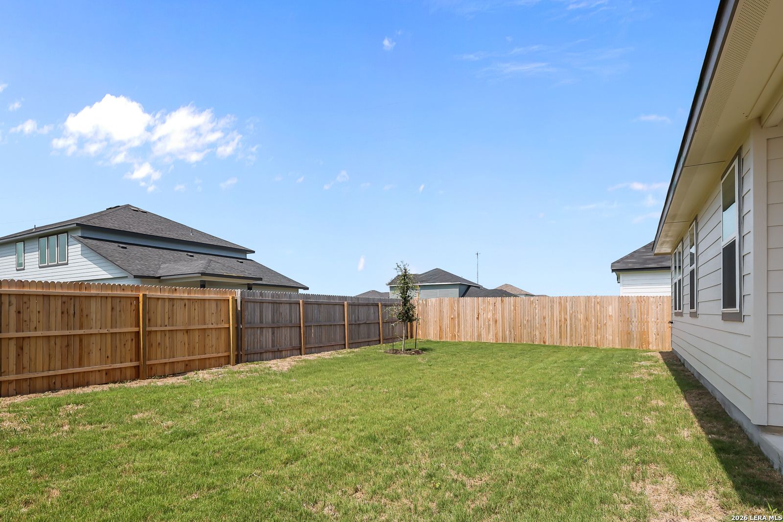 Private fenced backyard of The Daphne H floor plan by Davidson Homes in Hannah Heights, Seguin, Texas.