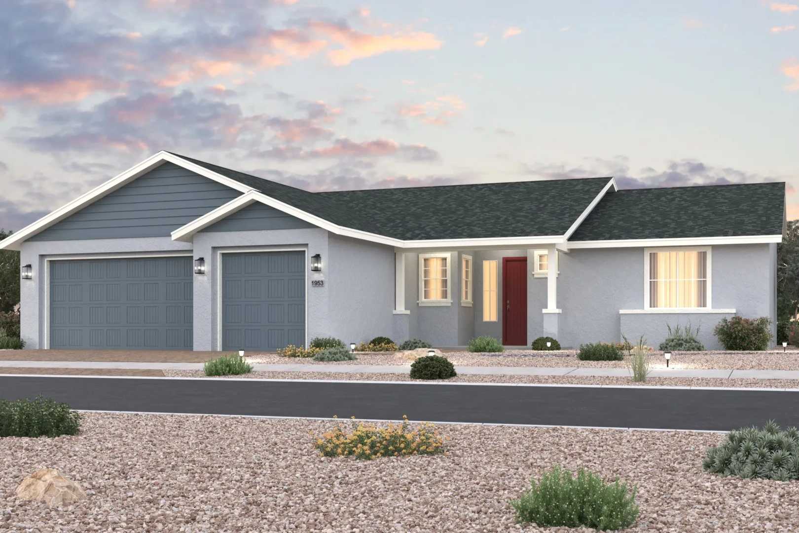 Contemporary single-story home exterior in Westwood Prescott AZ with desert landscaping, double garage, and sunset sky