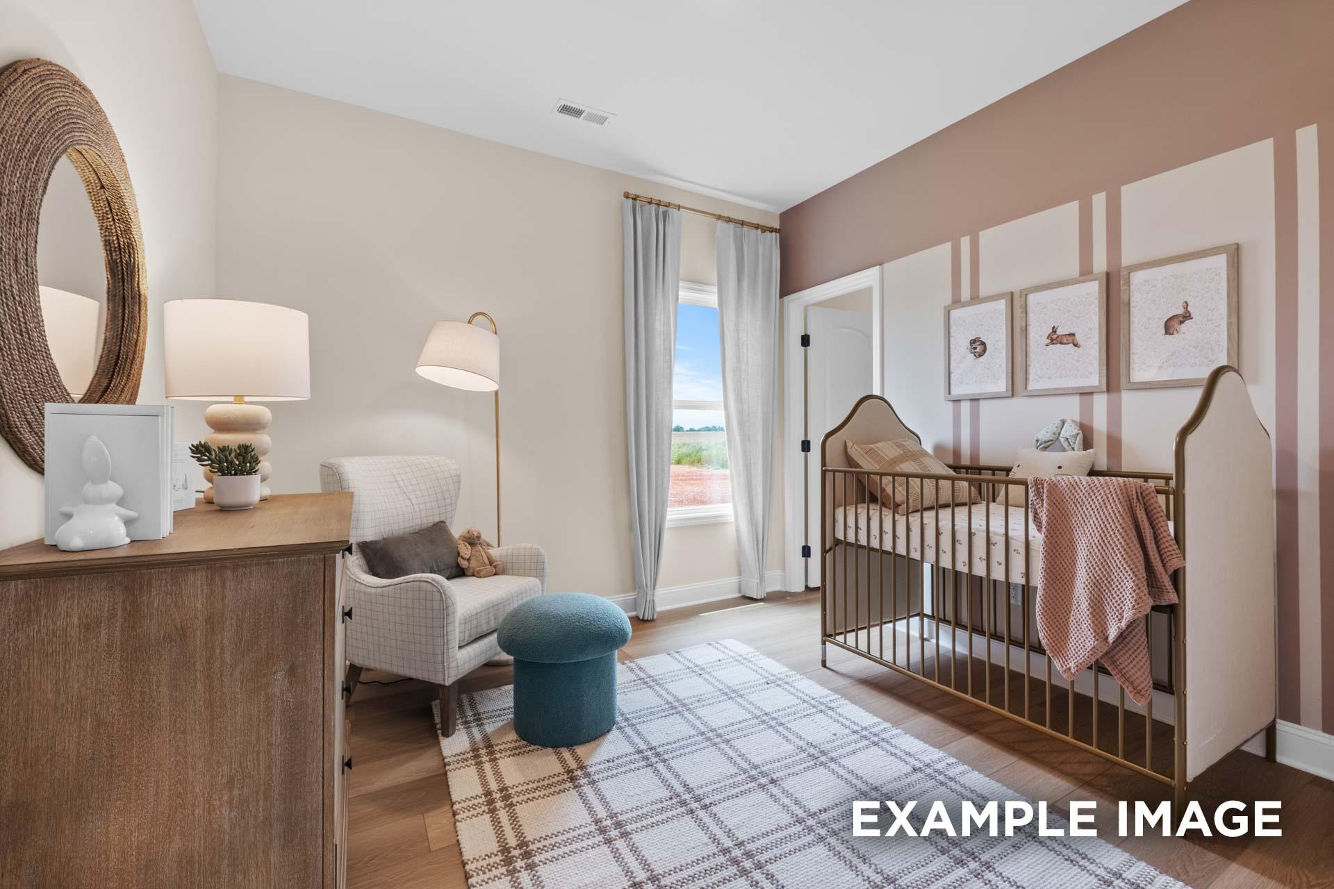 Cozy nursery in The Laurel M home design with wooden crib, armchair, dresser, round mirror, and beige walls