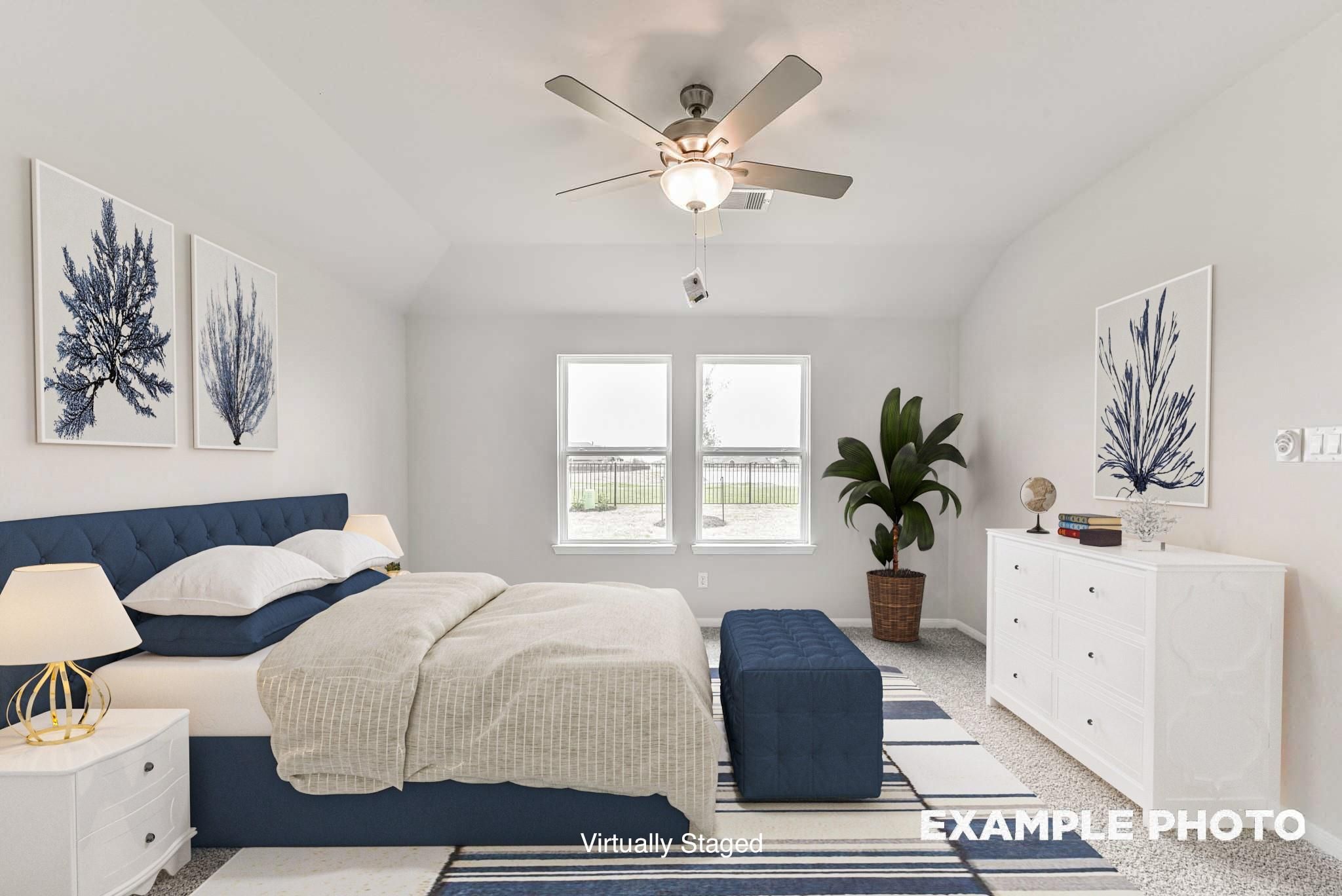 Bright, virtually staged primary bedroom in The Laguna C floor plan by Davidson Homes in Sunterra, Katy, Texas.
