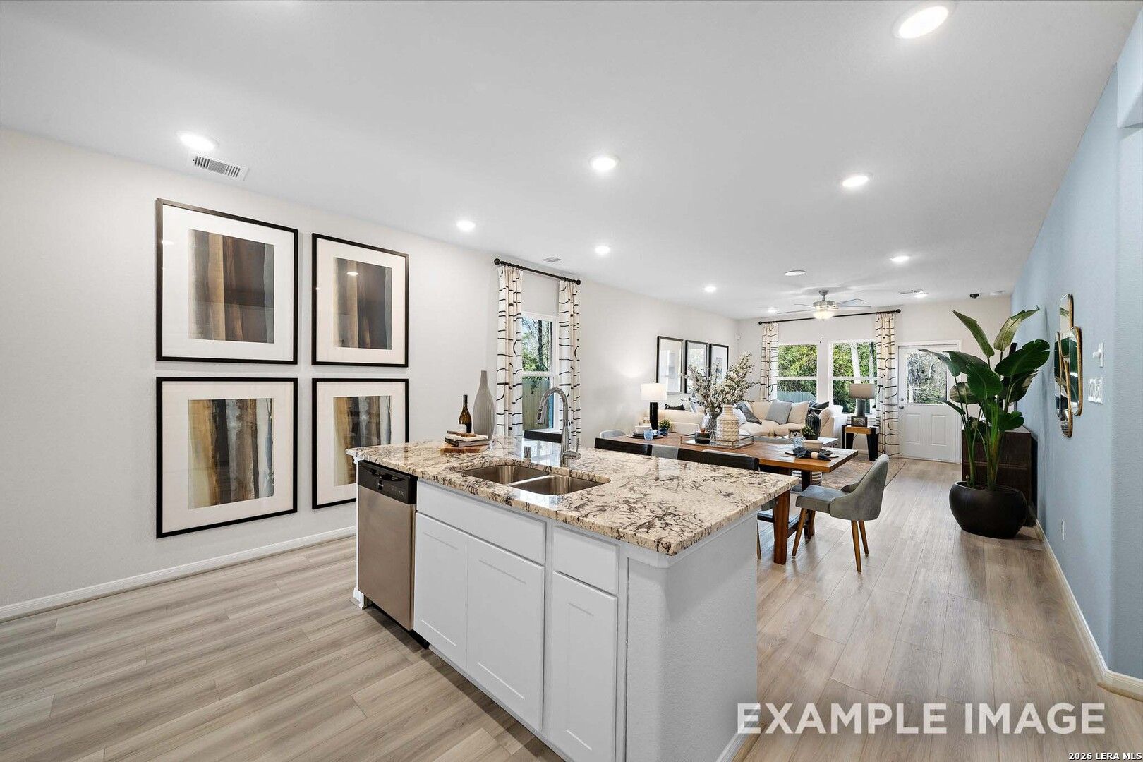 Open-concept kitchen and living area in San Marcos F floor plan by Davidson Homes, Rayburn Valley, San Antonio, Texas.