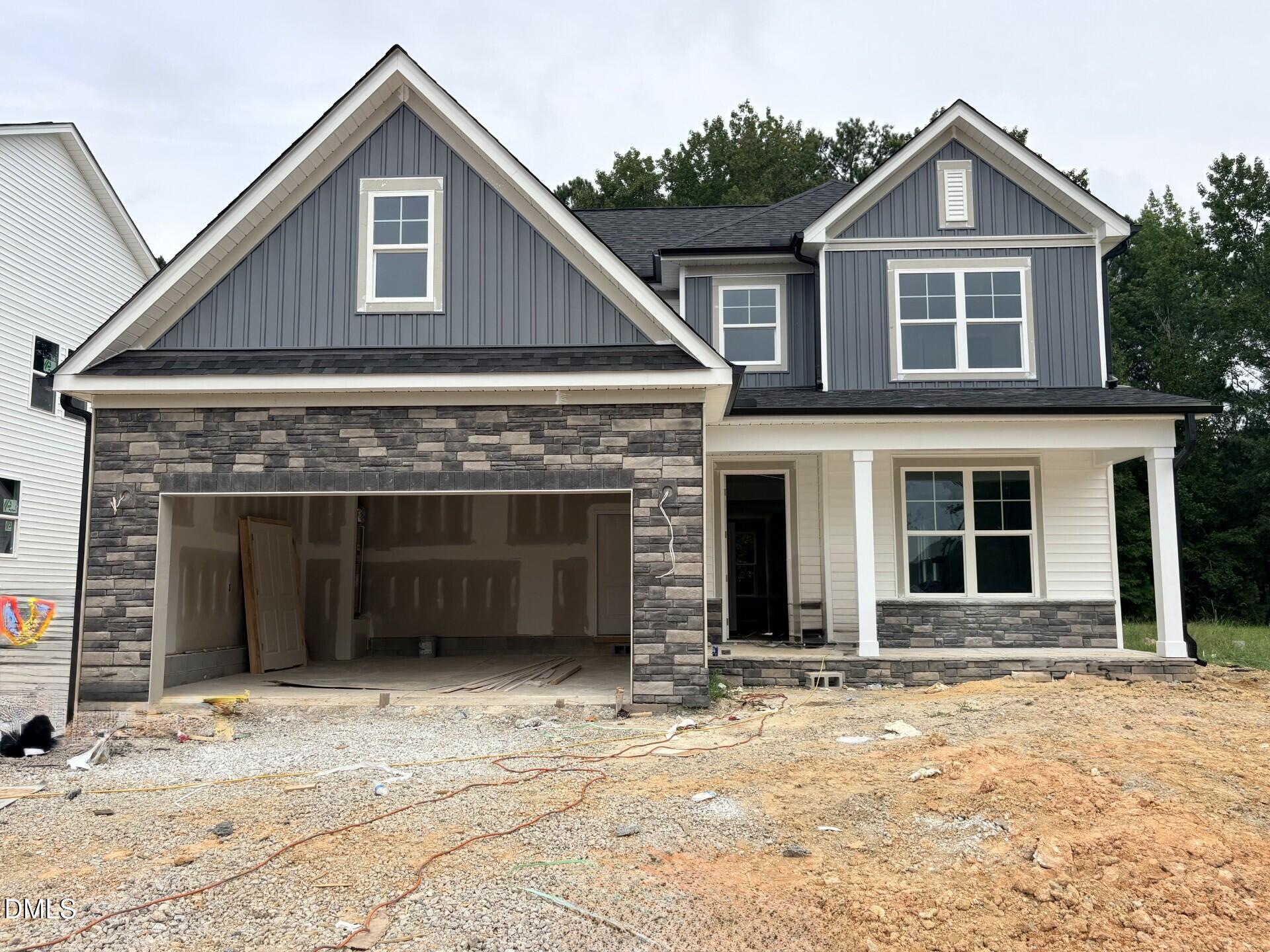 Two-story, 4-bedroom Ash C floor plan home by Davidson Homes under construction in Woodland Crossing, Zebulon, North Carolina.