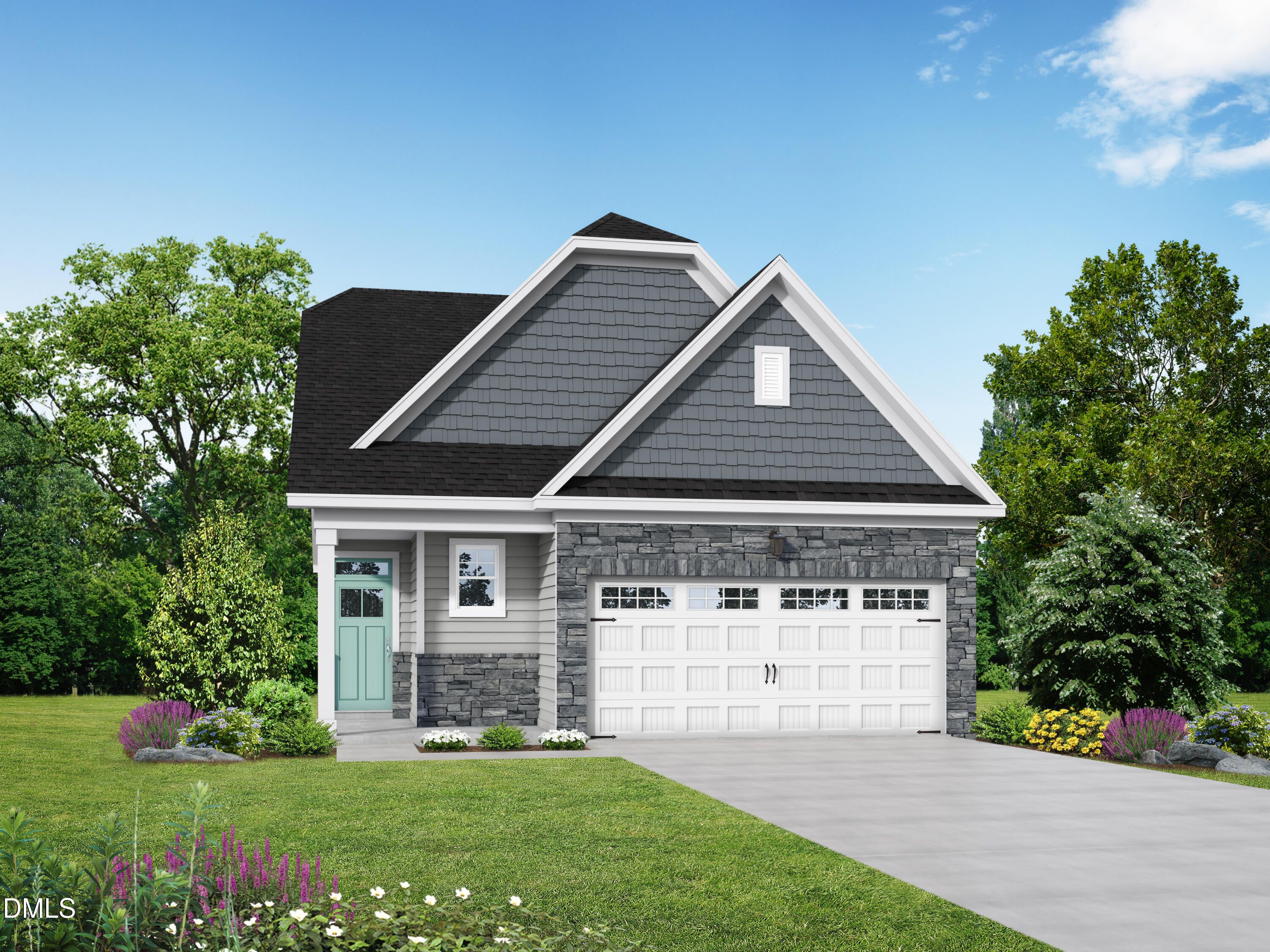 Modern 1-story Carter C home with blue siding, 2-car garage, stone accents, and lush landscaping in Wellers Knoll, Lillington, NC