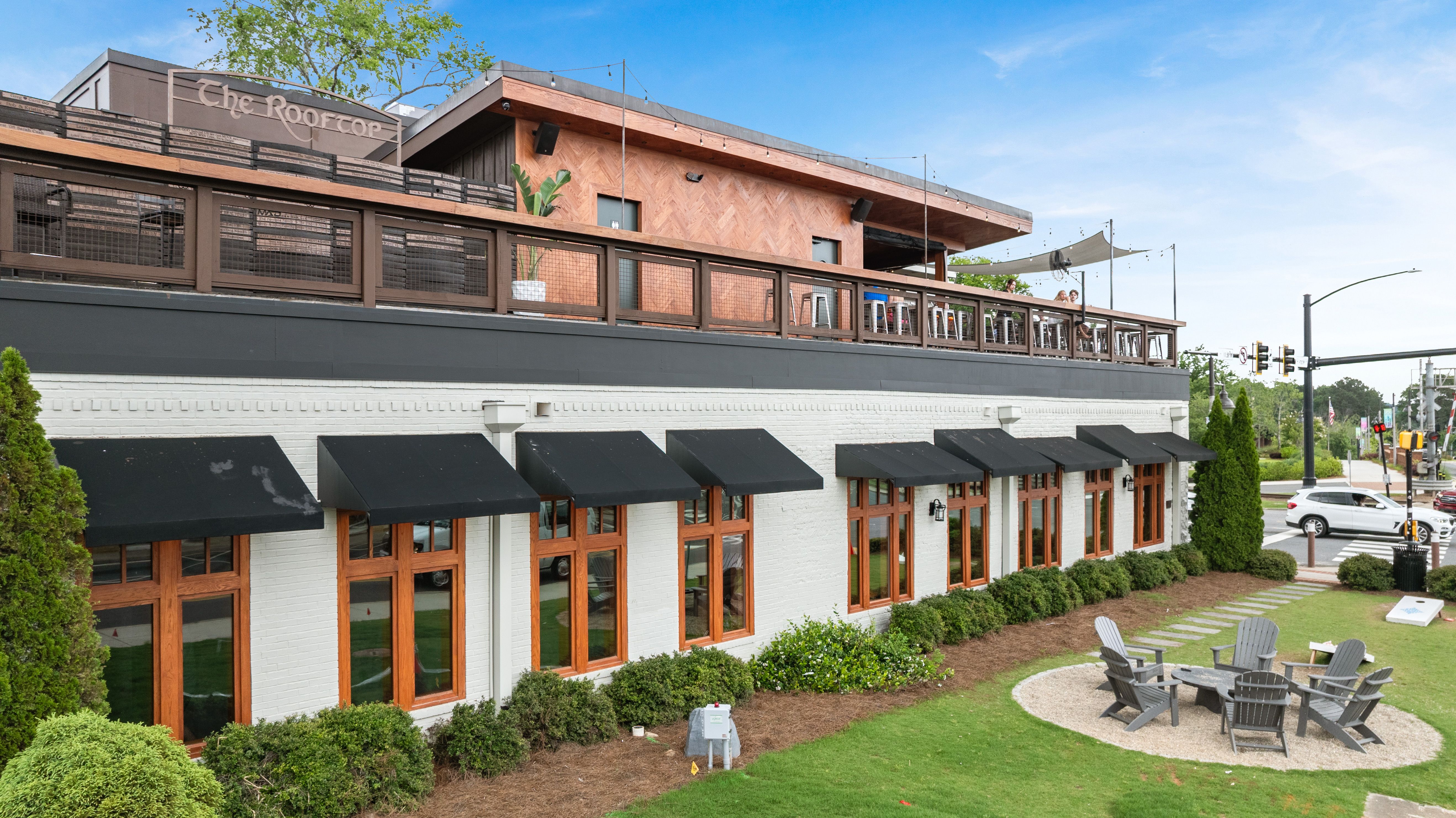 Rooftop lounge and outdoor fire pit area at Grafton Trace in Woodstock, Georgia by Davidson Homes.
