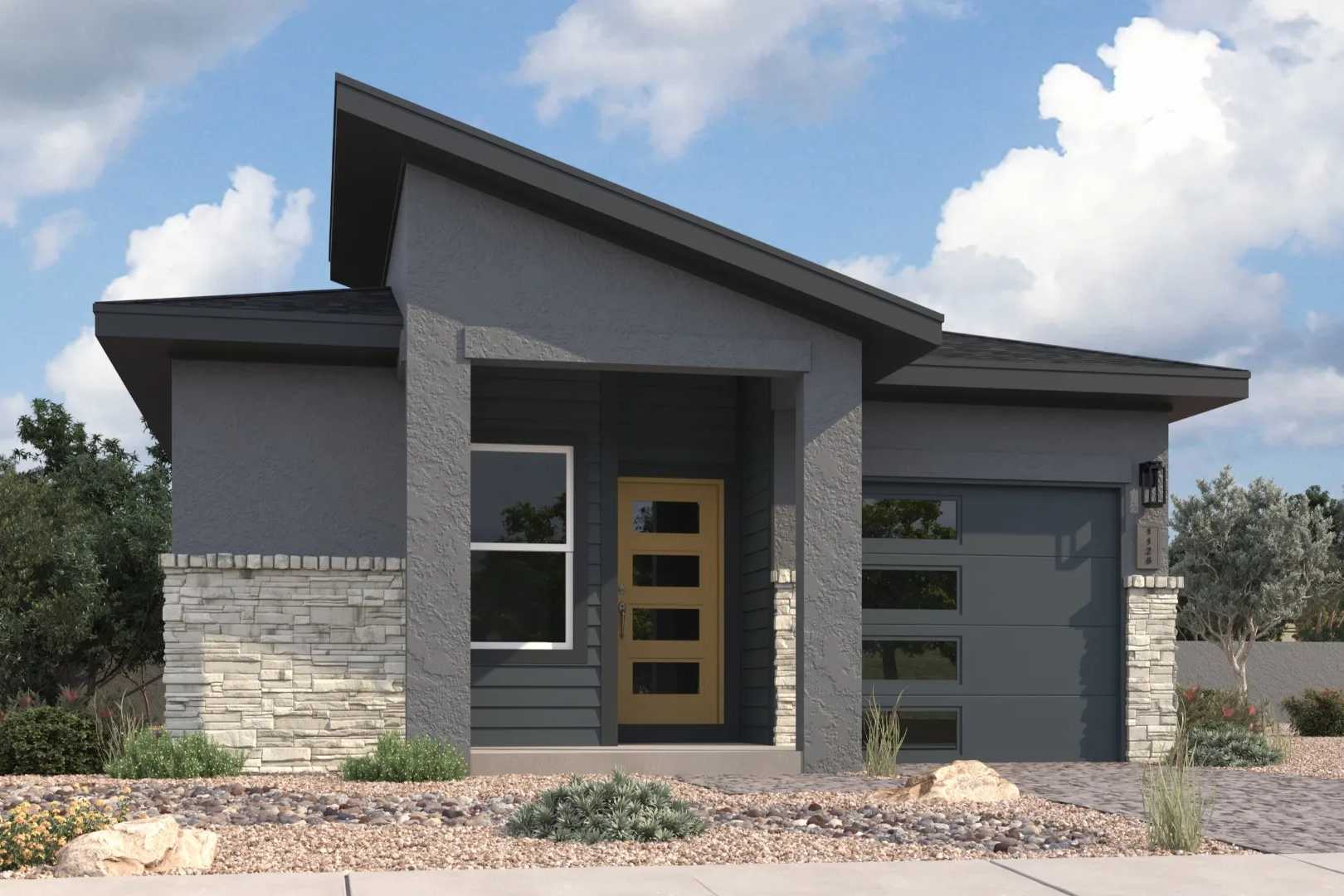 Contemporary gray exterior of The Marietta 2-bedroom single-story home featuring angular roof, stone accents, and desert landscaping in Prescott AZ