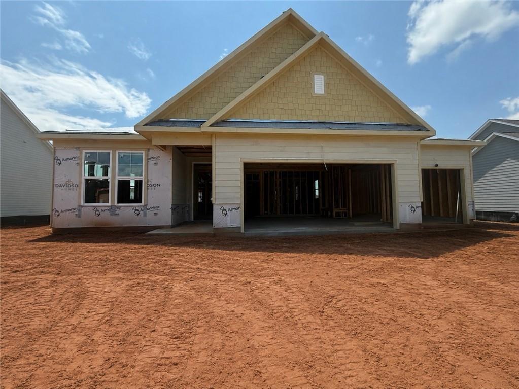 New construction 1-story The Glenwood A floor plan with 3-car garage by Davidson Homes in Wehunt Meadows, Hoschton, Georgia.
