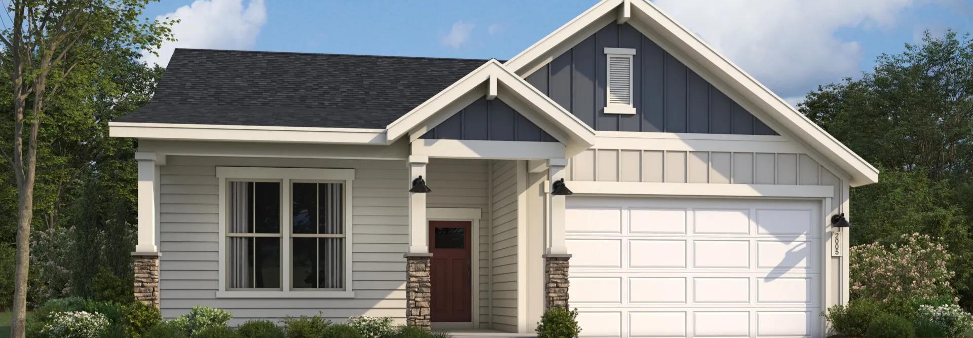 Modern craftsman ranch home exterior at Cape Reserve Donahue Ridge in Auburn Alabama with gabled roof stone accents and covered porch