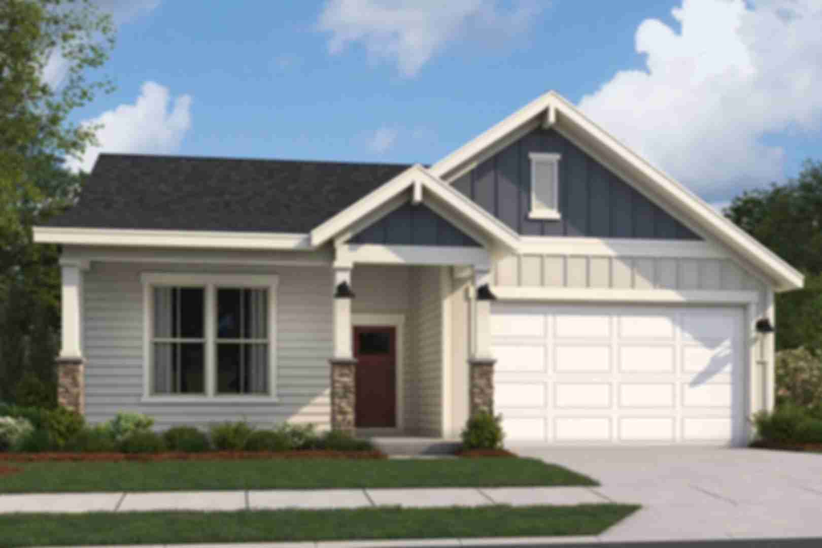 Modern craftsman ranch home exterior at Cape Reserve Donahue Ridge in Auburn Alabama with gabled roof stone accents and covered porch