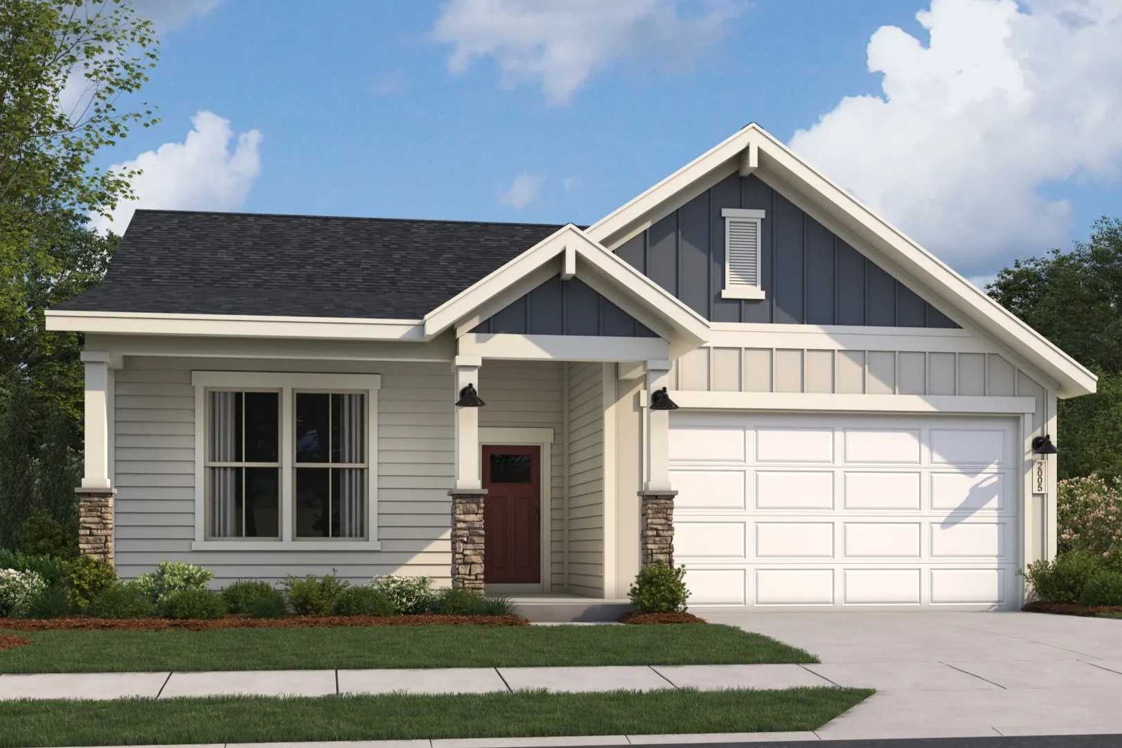 Modern craftsman home exterior at Cape Reserve Donahue Ridge in Auburn Alabama with covered porch and two-car garage