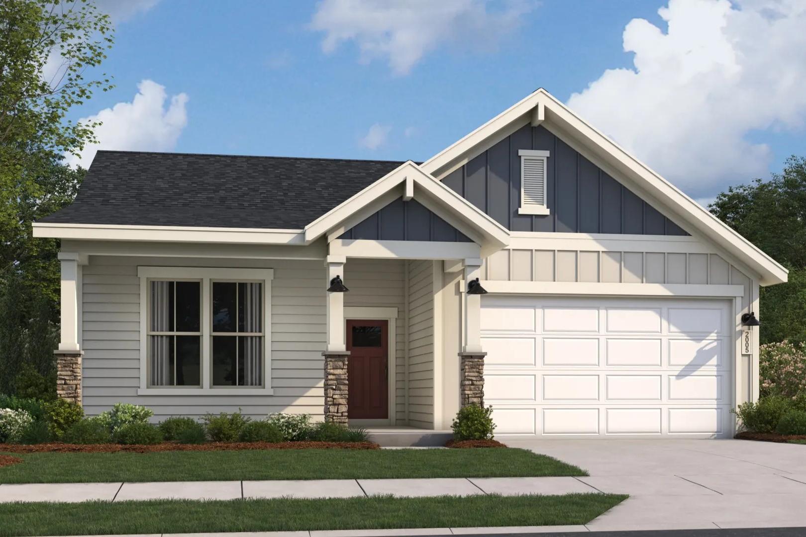 Modern craftsman home exterior at Cape Reserve Donahue Ridge in Auburn Alabama with covered porch and two-car garage